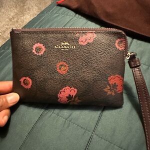 Coach Dark Brown Wristlet with Pink Floral Design
